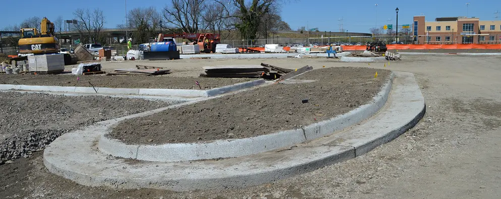 Construction site with curved concrete paths