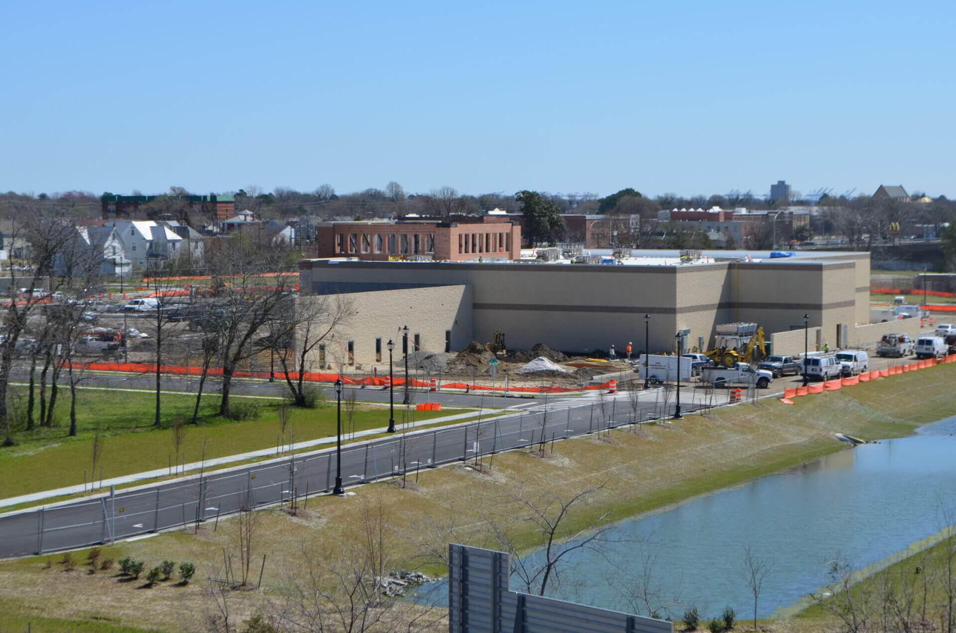 Building under construction with vehicles